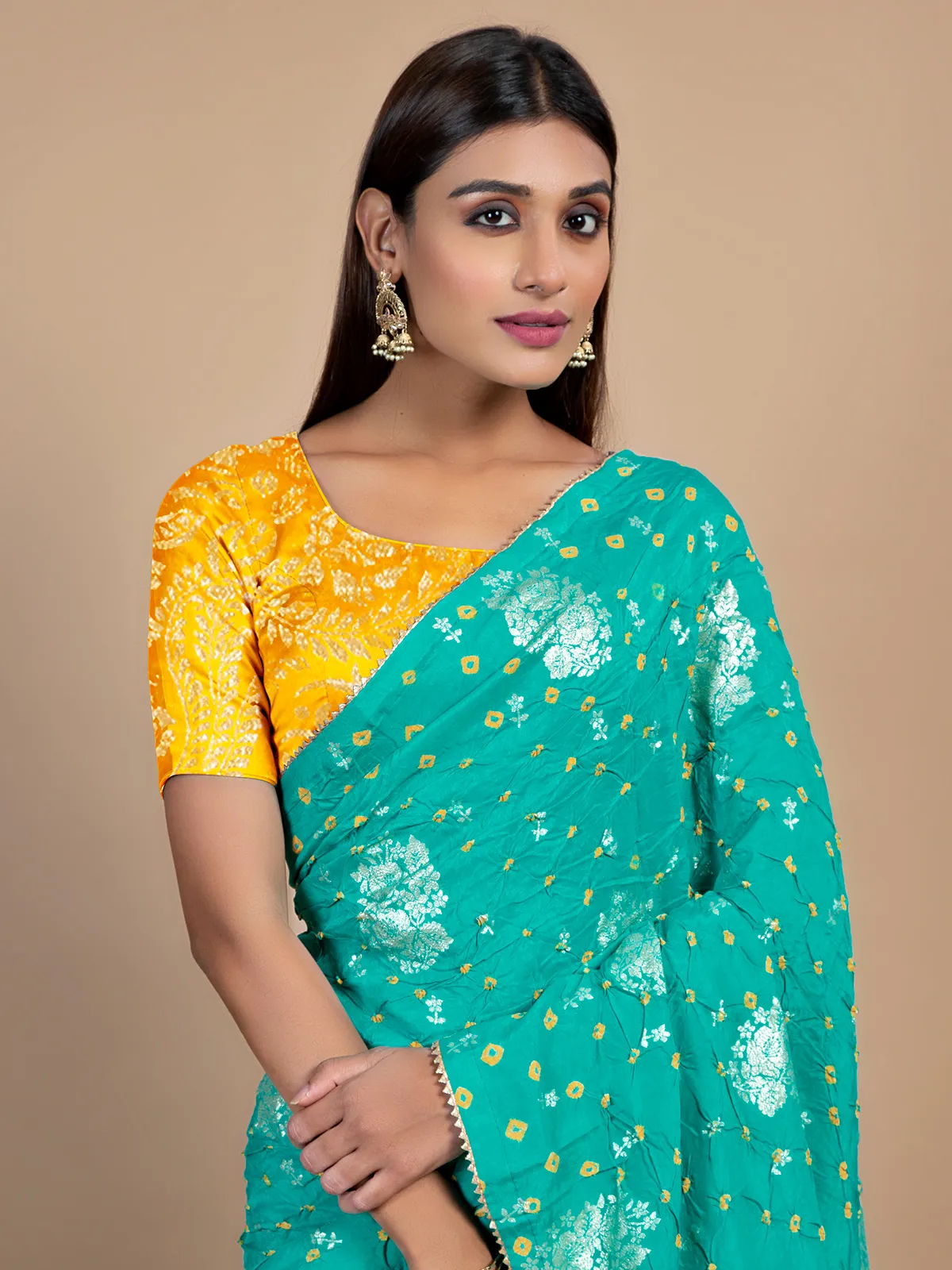 Turquoise green wedding wear bandhej saree