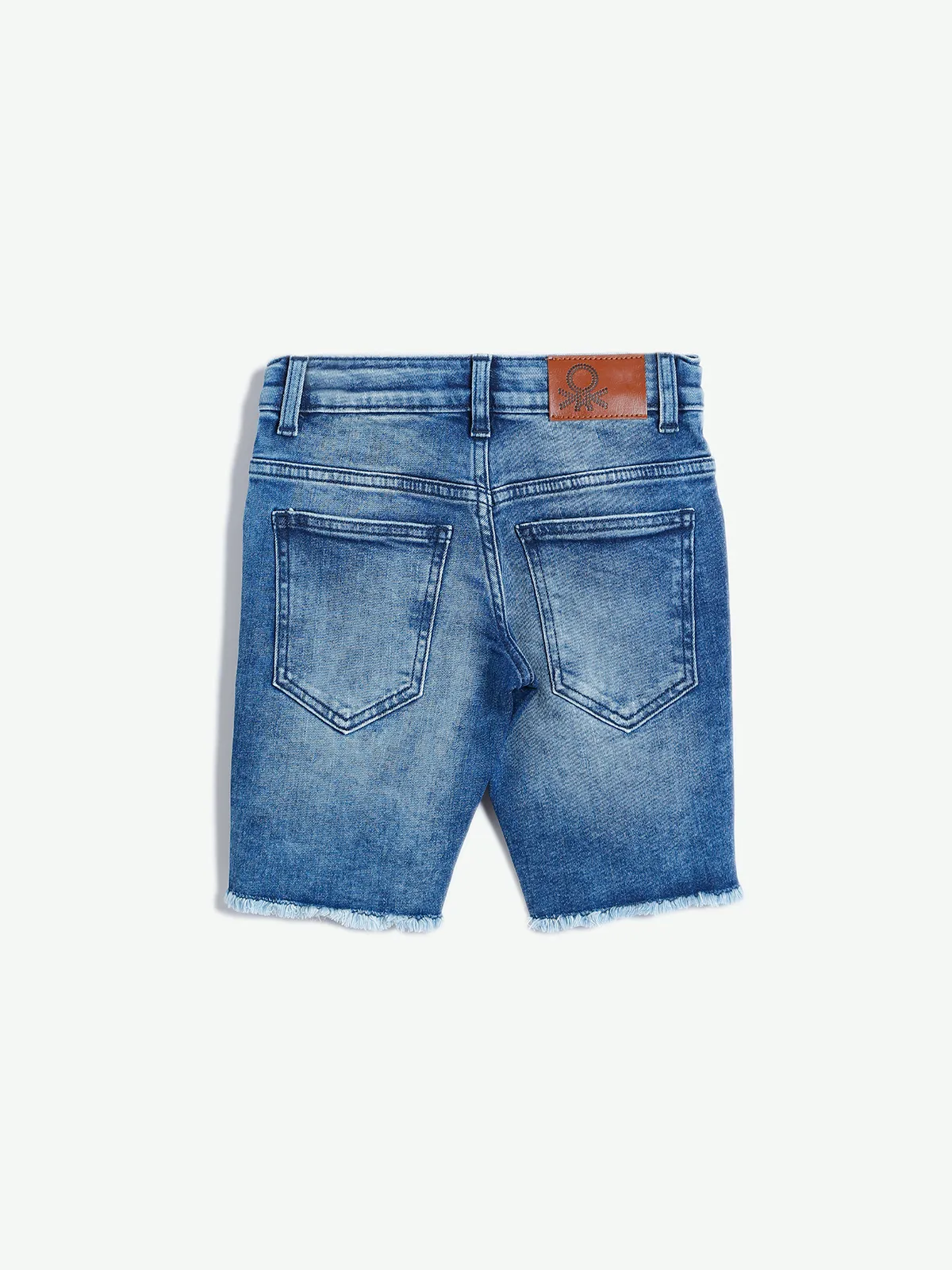 UCB blue washed denim ripped shorts