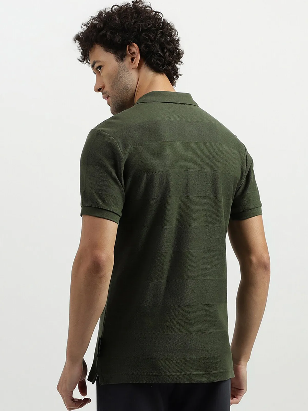 UCB dark green stripe t shirt