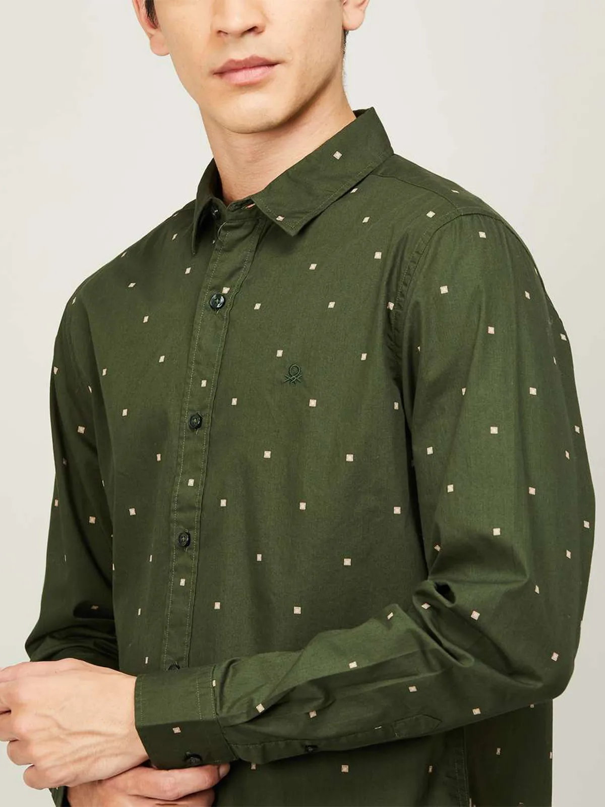 UCB printed style dark green tint shirt