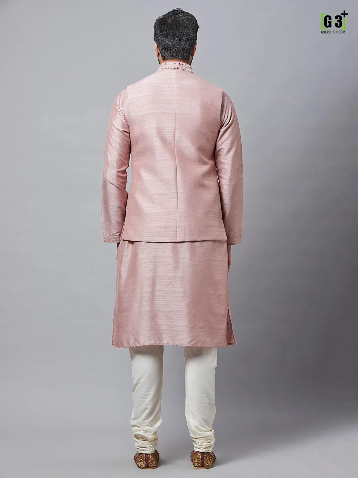 Waistcoat paired with onion pink raw silk kurta suit