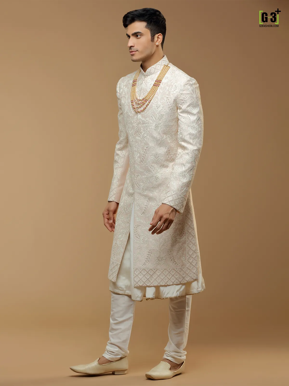 Wedding wear peach hued silk sherwani