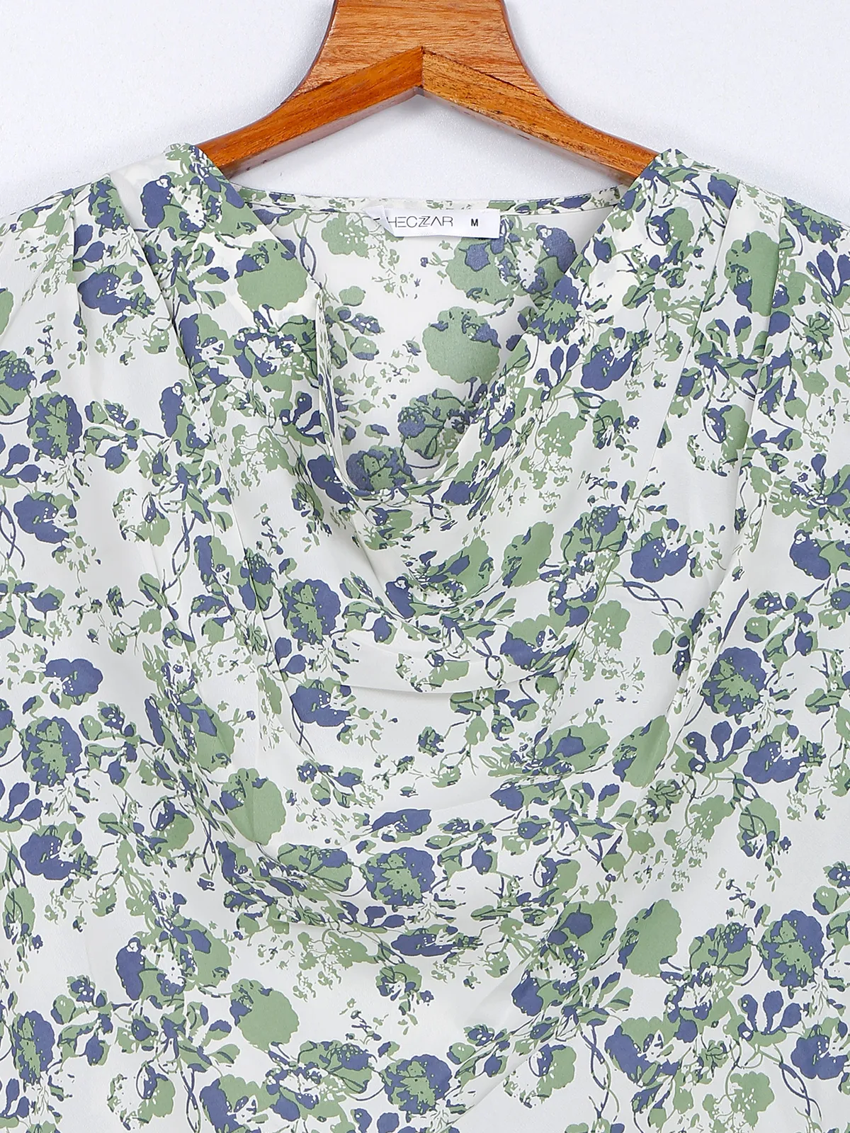 White and green polyester printed top