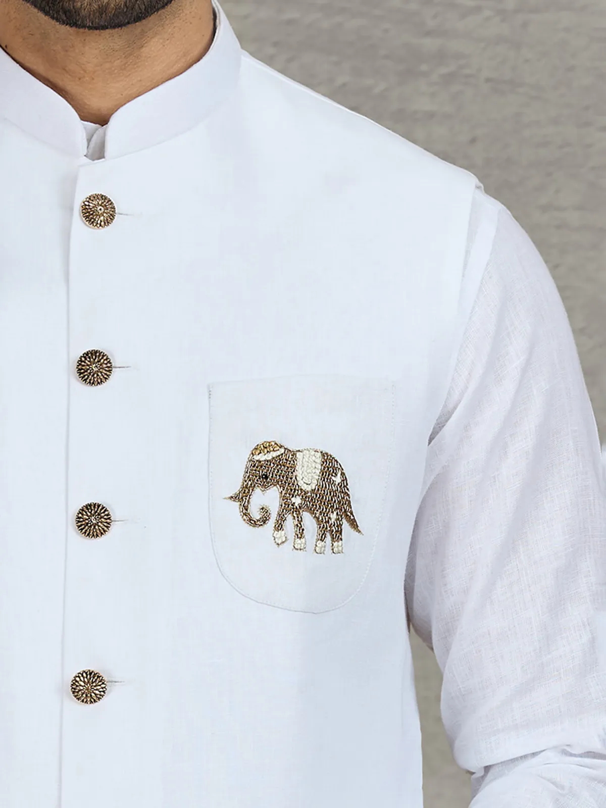 White linen waistcoat with shirt and intricate zardosi work