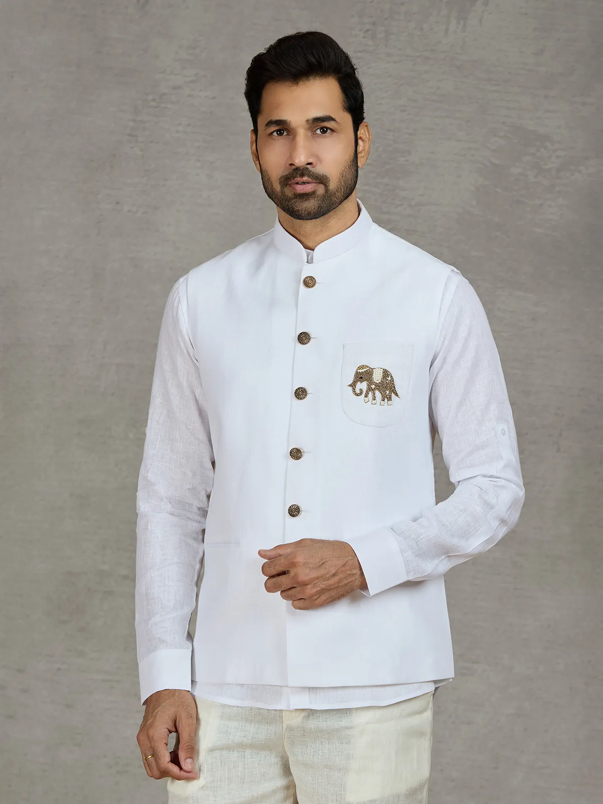 White linen waistcoat with shirt and intricate zardosi work