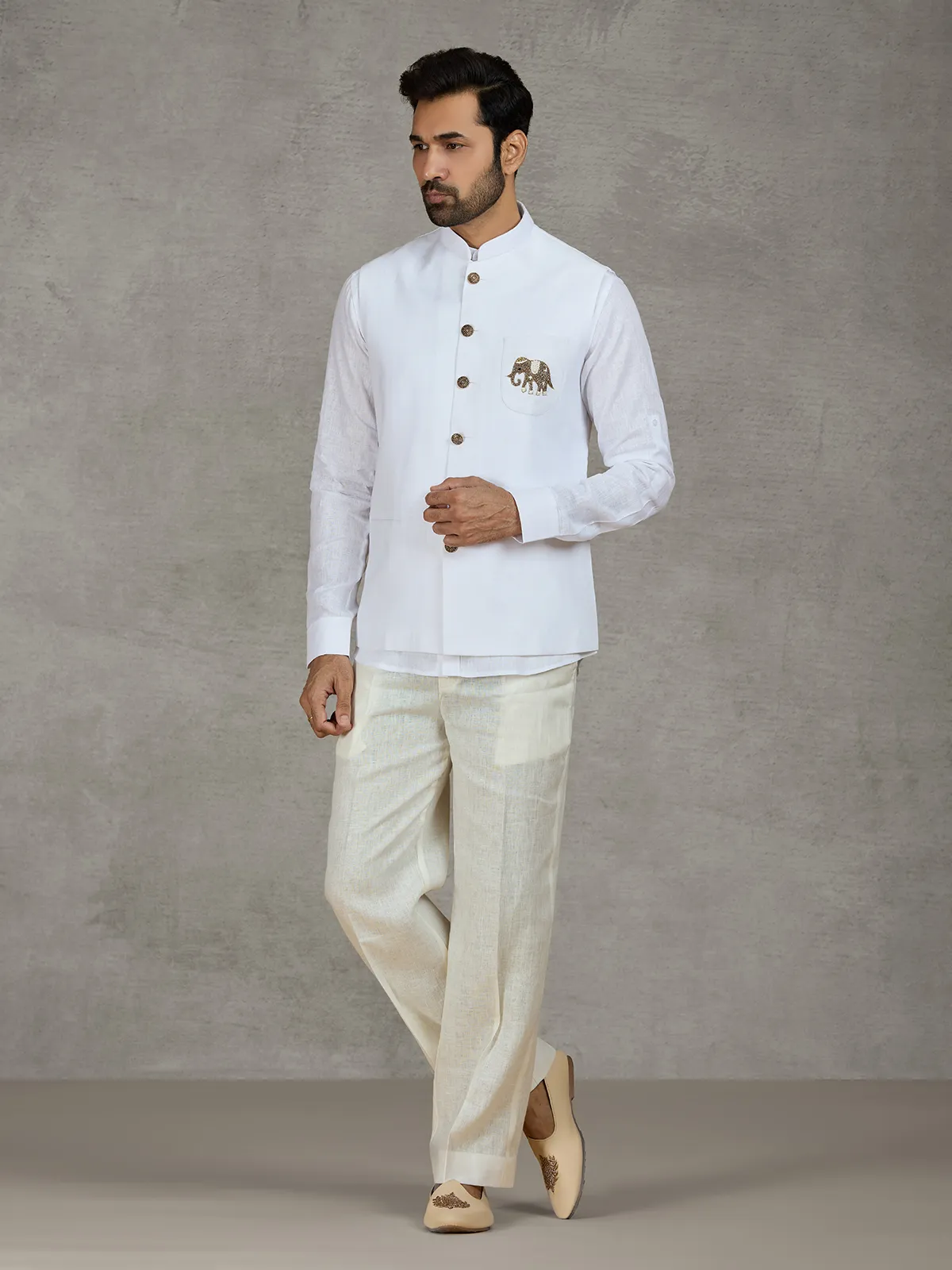 White linen waistcoat with shirt and intricate zardosi work