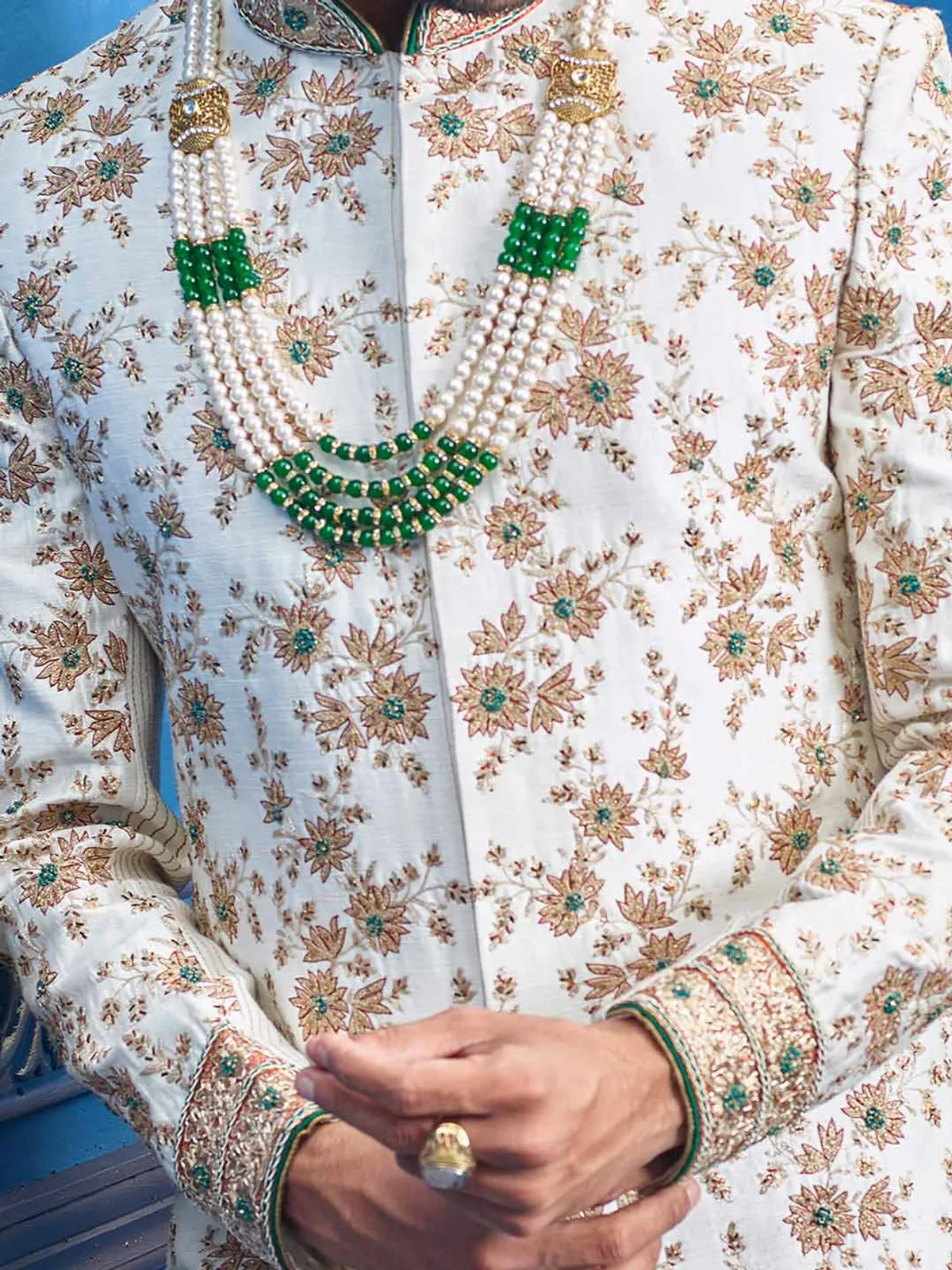 White silk groom wear sherwani