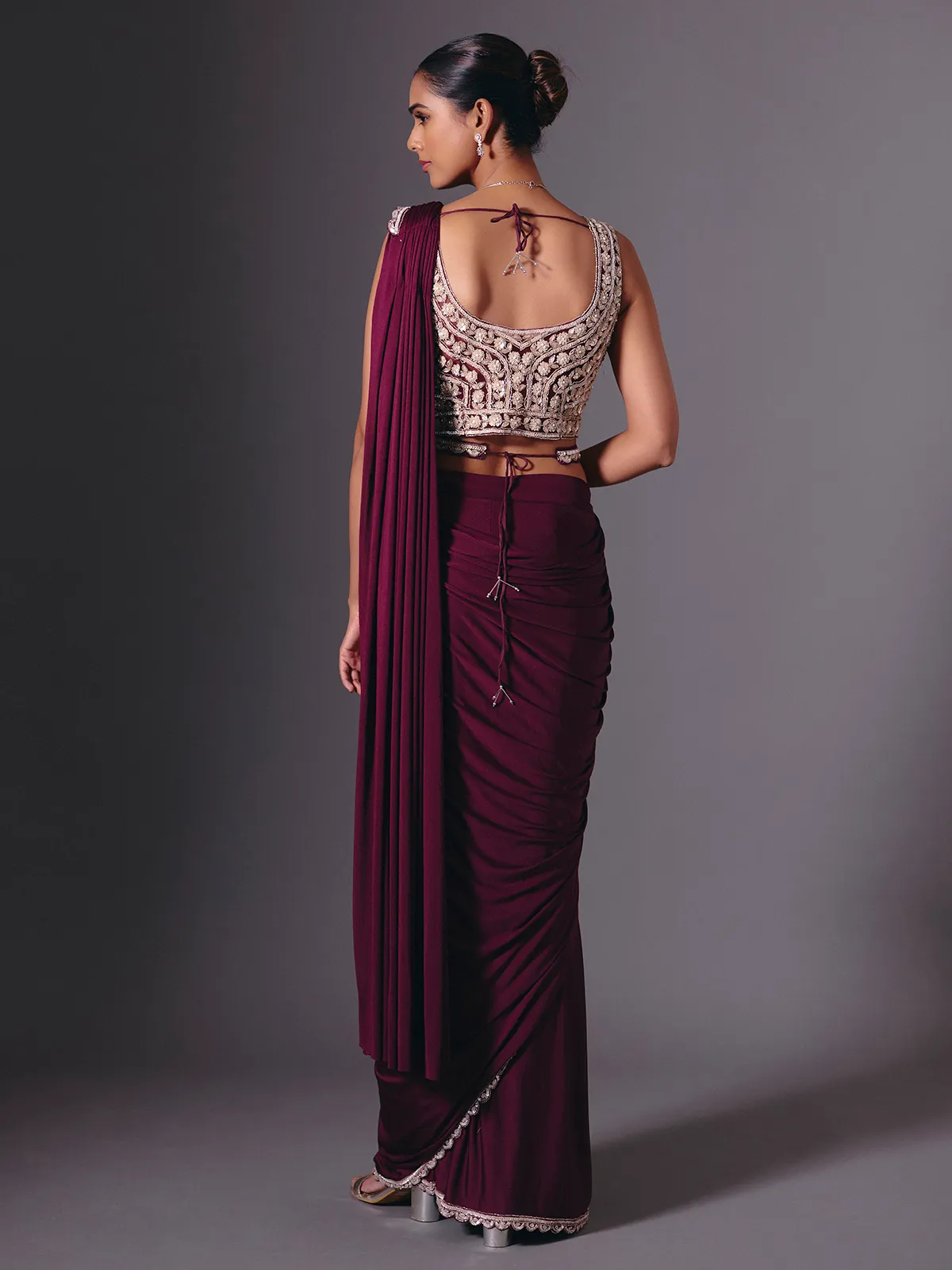 Wine lycra saree with sparkling cutdana and pearl work