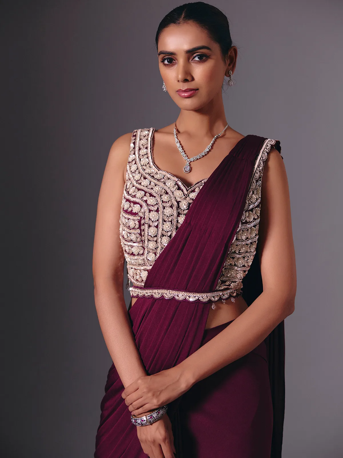 Wine lycra saree with sparkling cutdana and pearl work