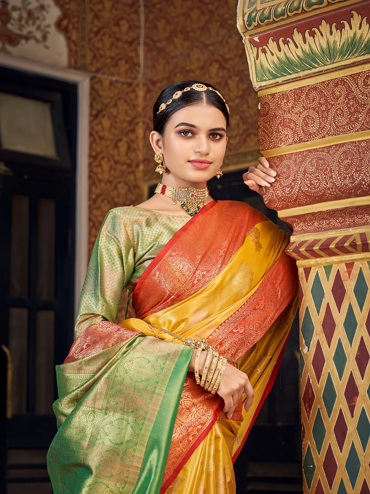 Yellow banarasi silk saree with contrast border