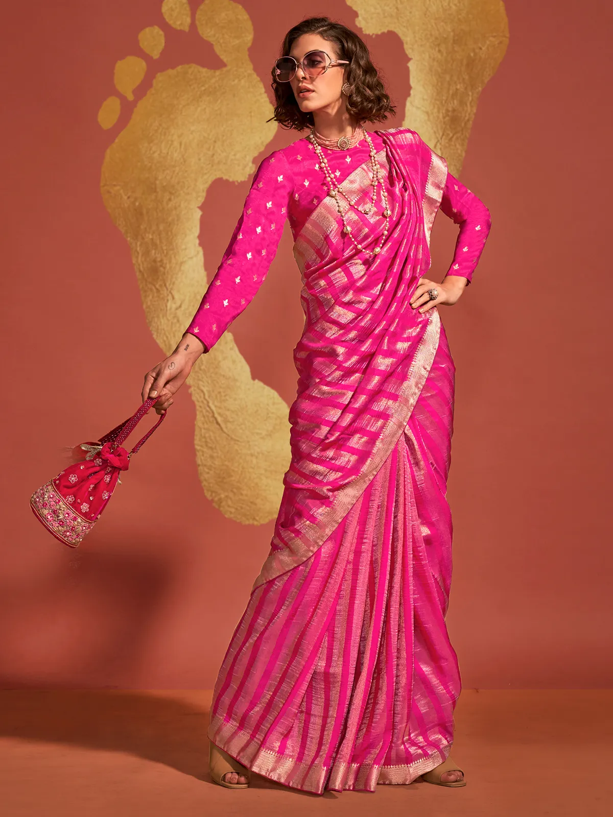 Zari weaving magenta saree