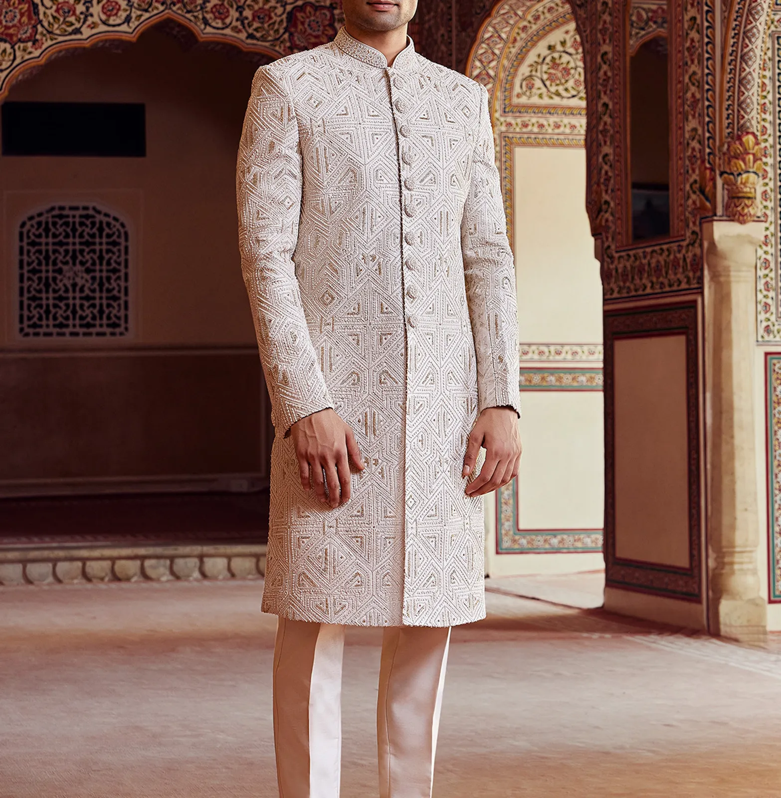 Peshwai style cream peach sherwani for groom