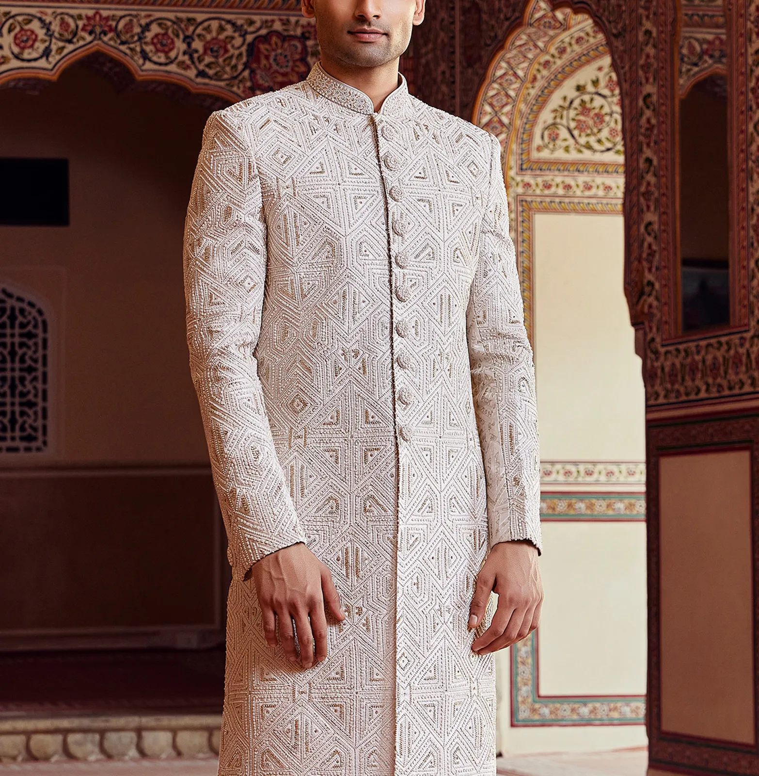 Peshwai style cream peach sherwani for groom