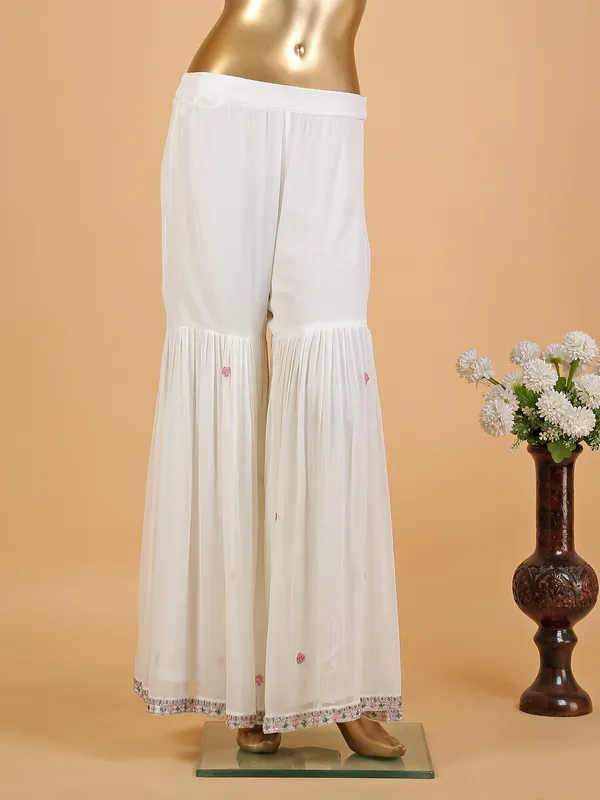 Elegant off-white georgette sharara suit