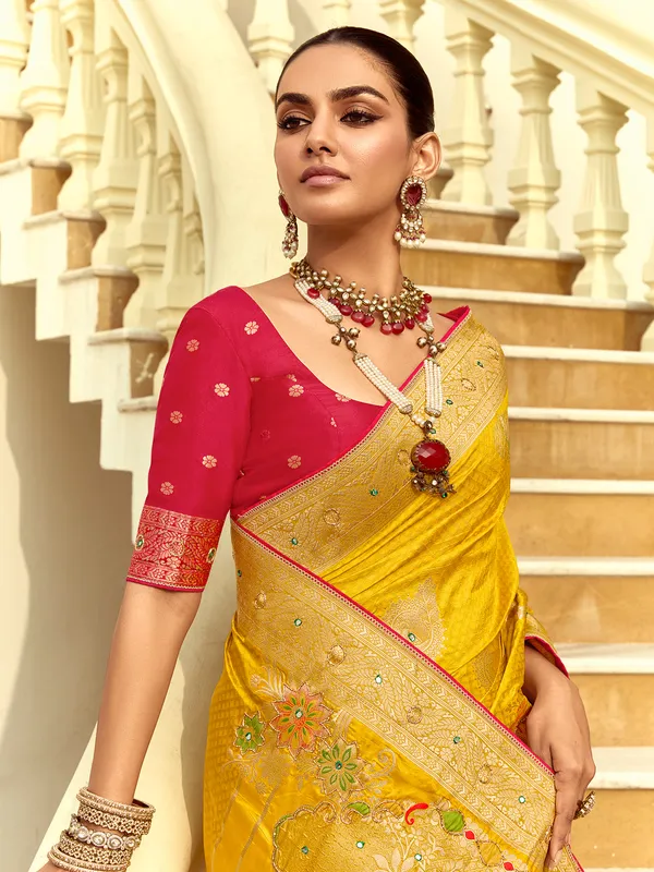 Yellow silk saree with zari work for reception wear
