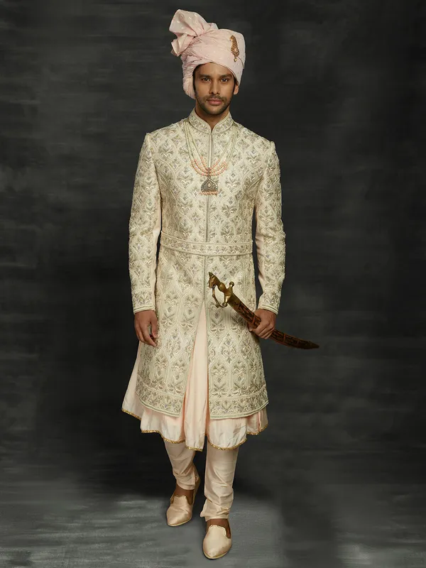 A eternal light peach wedding sherwani in silk