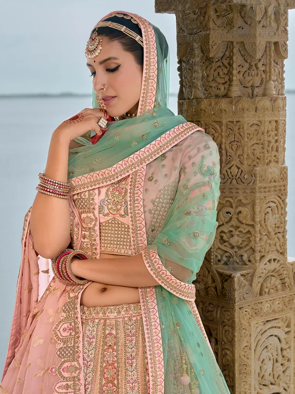 Alluring light pink silk lehenga from for wedding