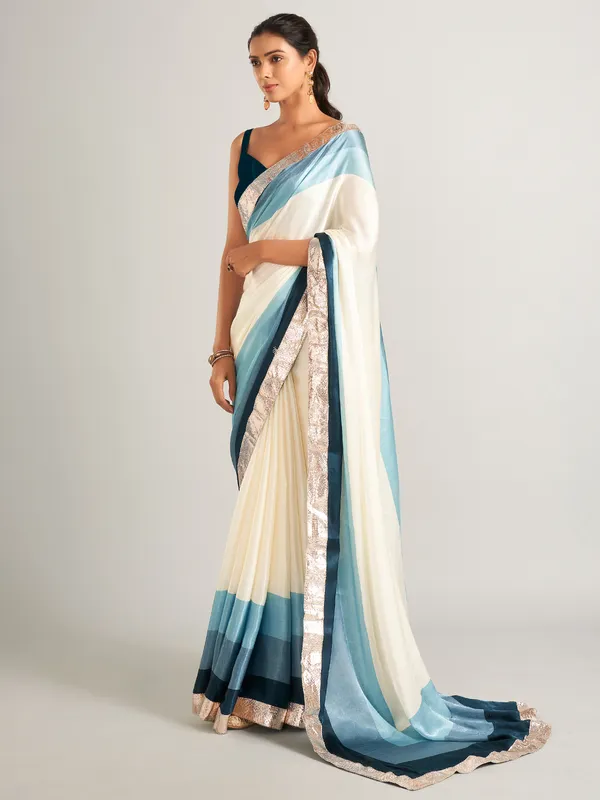 Appealing cream and blue masru silk saree