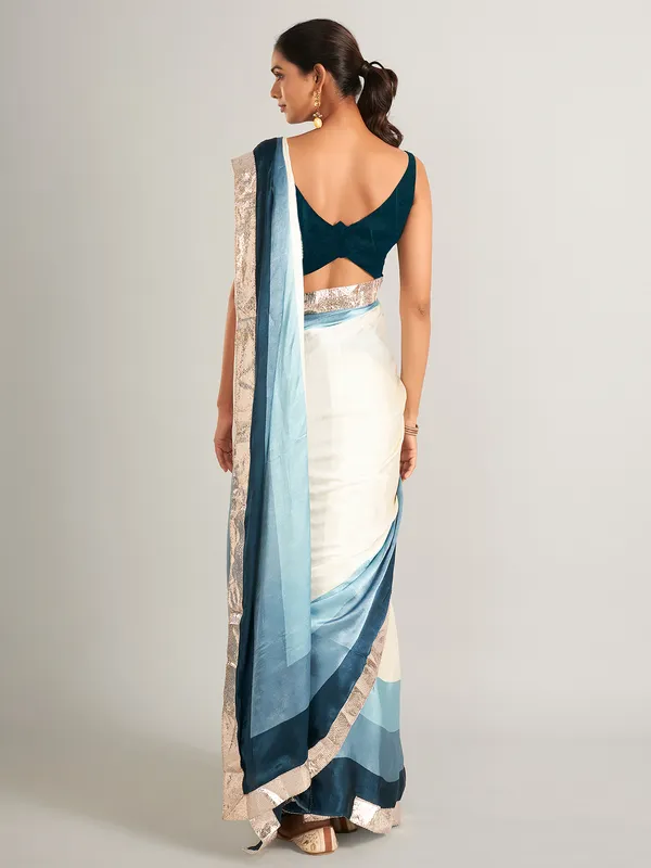 Appealing cream and blue masru silk saree
