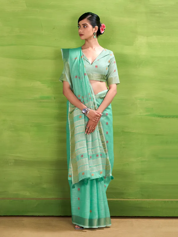Aqua blue linen silk printed zari saree