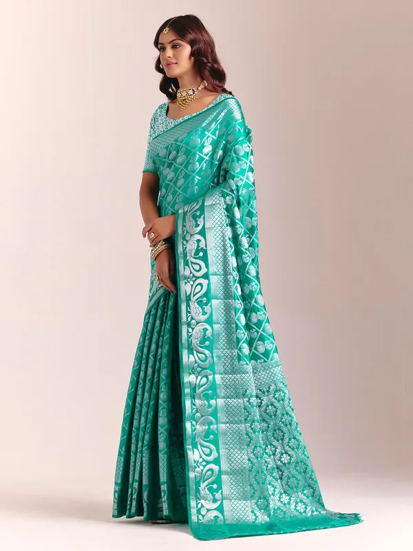 Aqua blue silk saree with zari shine