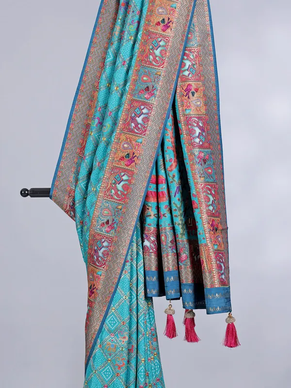 Aqua dola silk saree with colorful motifs
