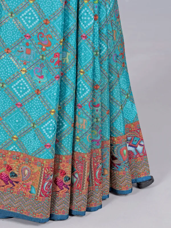 Aqua dola silk saree with colorful motifs