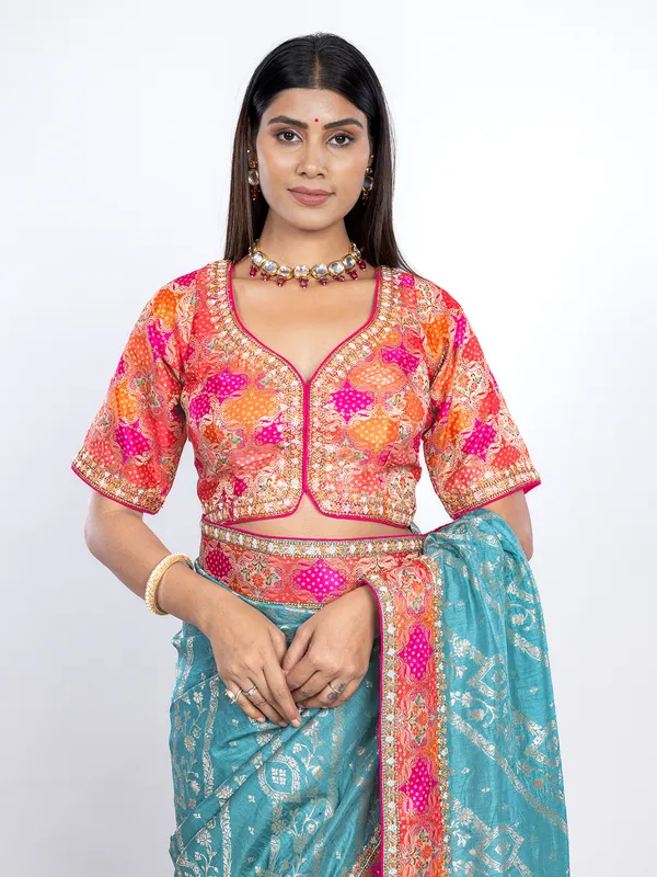 Aqua dola silk saree with orange blouse