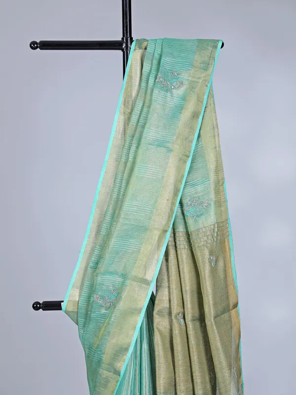 Aqua festive wear tissue silk saree with sequins detailing