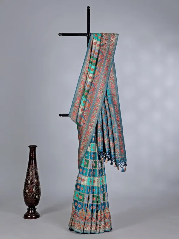 Aqua green printed mashru silk saree with zari detailing