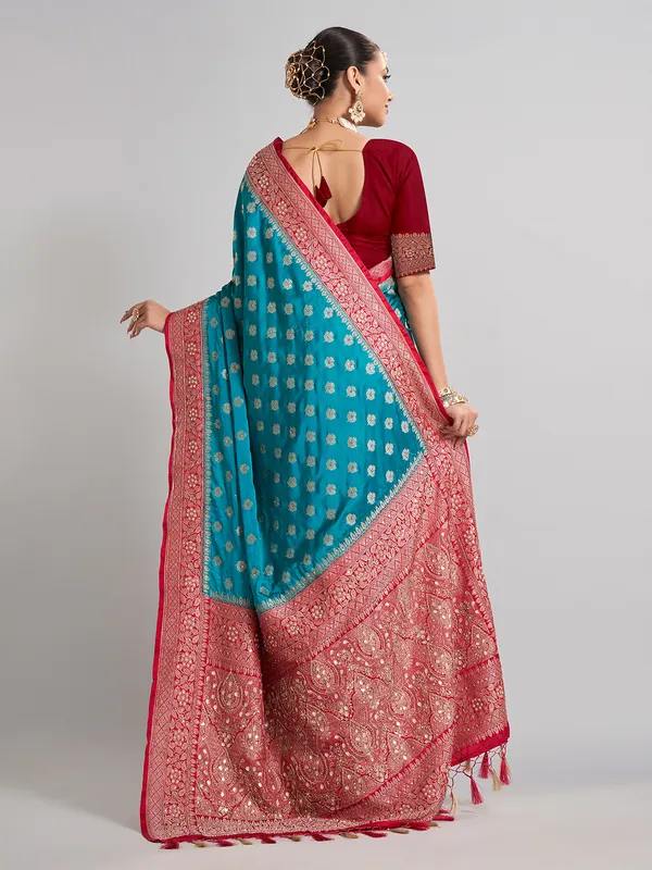 Aqua satin silk saree with festive contrast border design