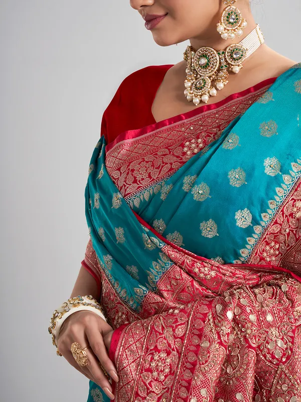 Aqua satin silk saree with festive contrast border design