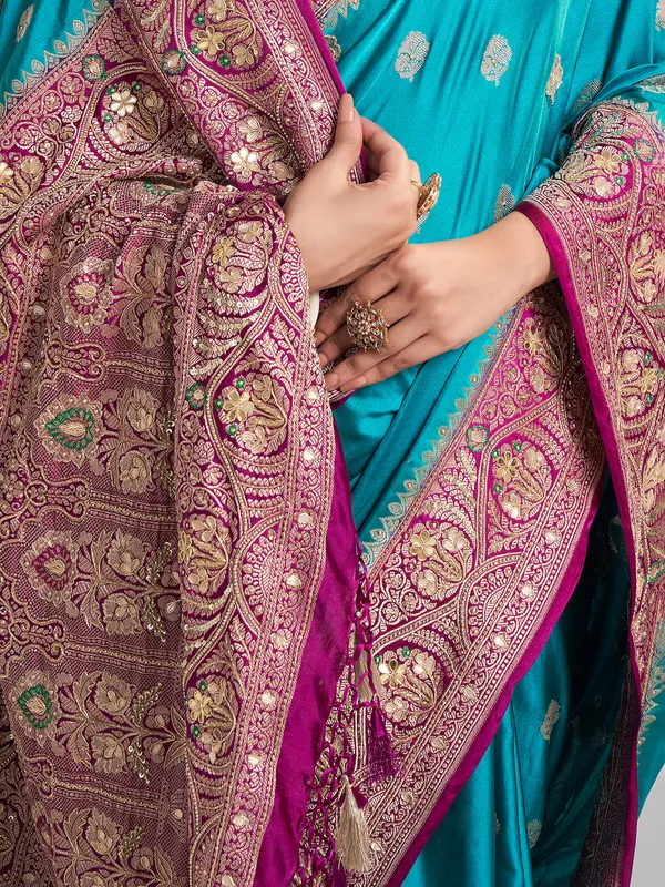 Aqua satin silk saree with traditional gota and zari work