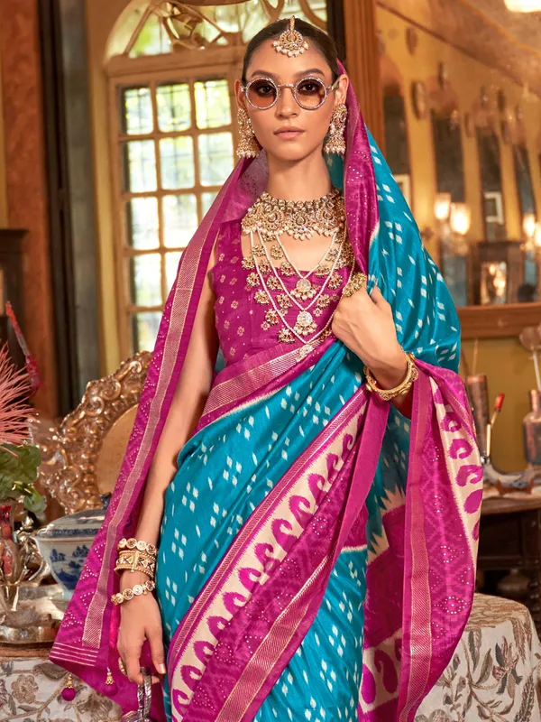 Aqua silk printed saree with contrast blouse