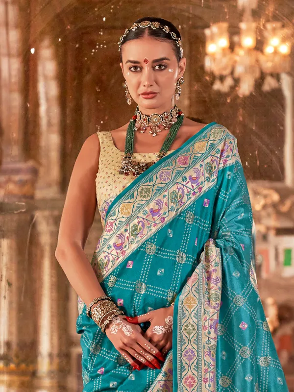 Aqua silk saree with bandhej print