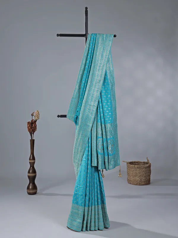 Aqua silk saree with subtle zari highlights