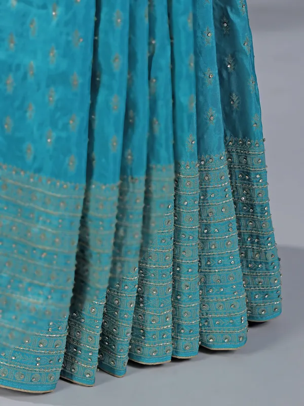 Aqua silk saree with subtle zari highlights