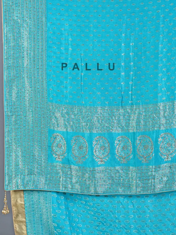 Aqua silk saree with subtle zari highlights