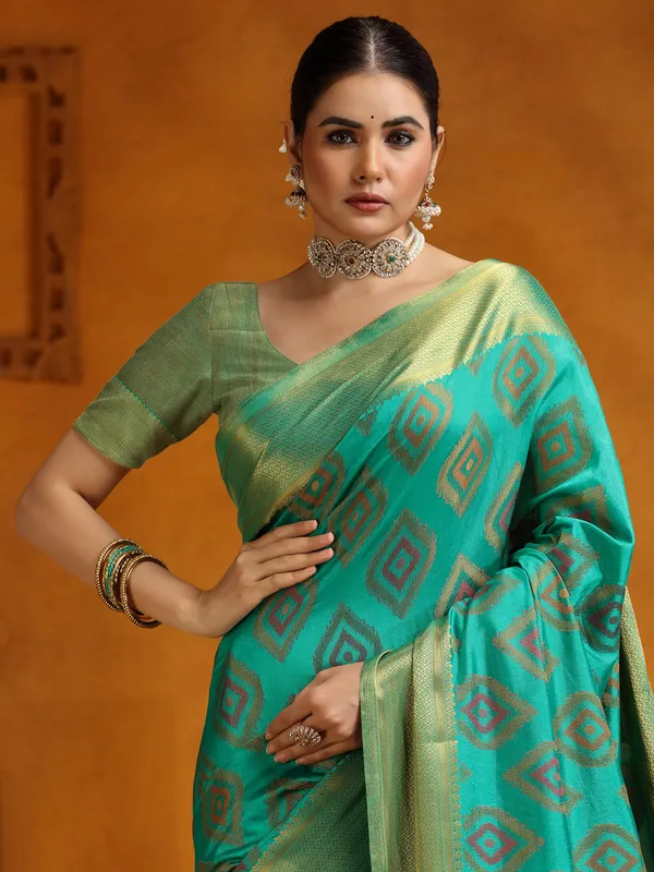 Aqua silk saree with zari embellishment