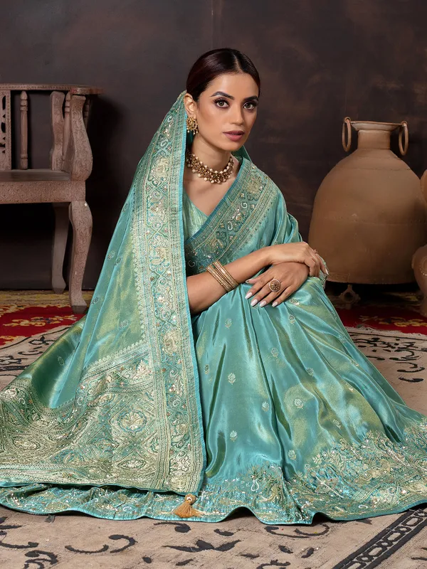 Aqua wedding wear saree in soft dola silk