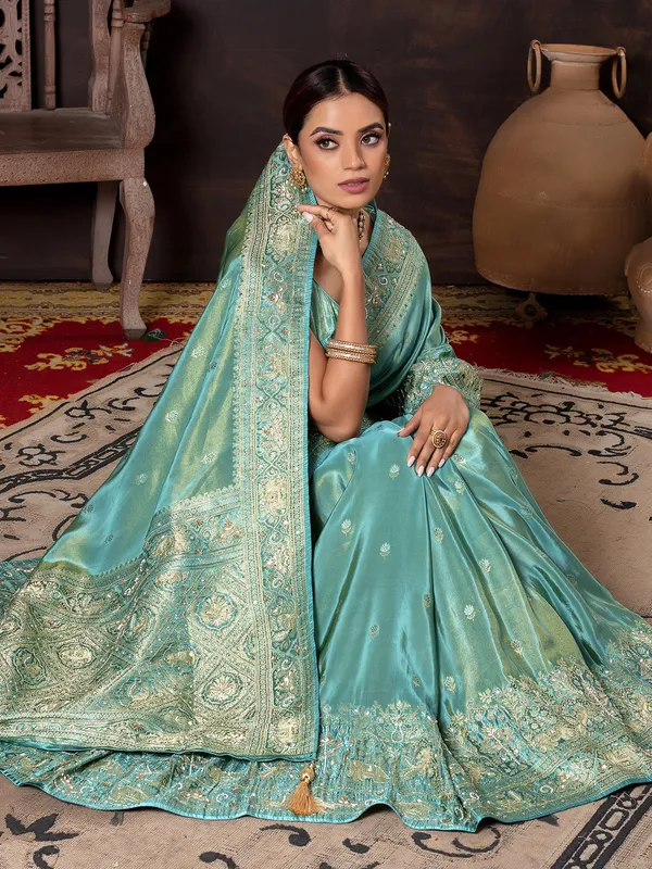 Aqua wedding wear saree in soft dola silk