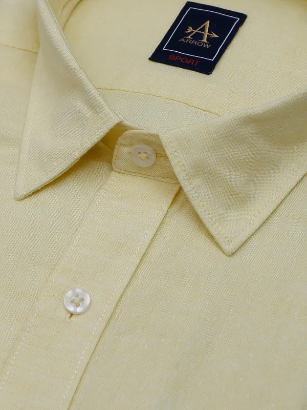 Arrow plain cotton light yellow shirt for formal wear