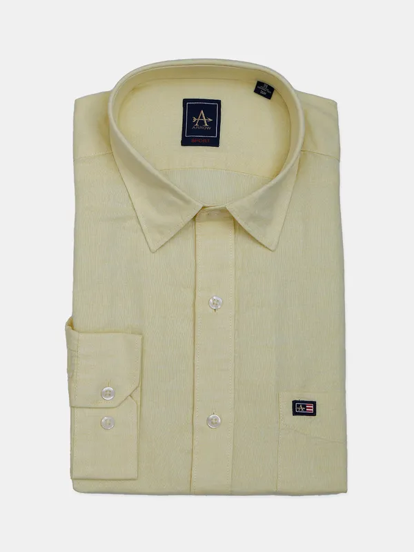 Arrow plain cotton light yellow shirt for formal wear