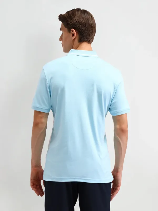 ARROW SPORT sky blue and white color block polo t-shirt