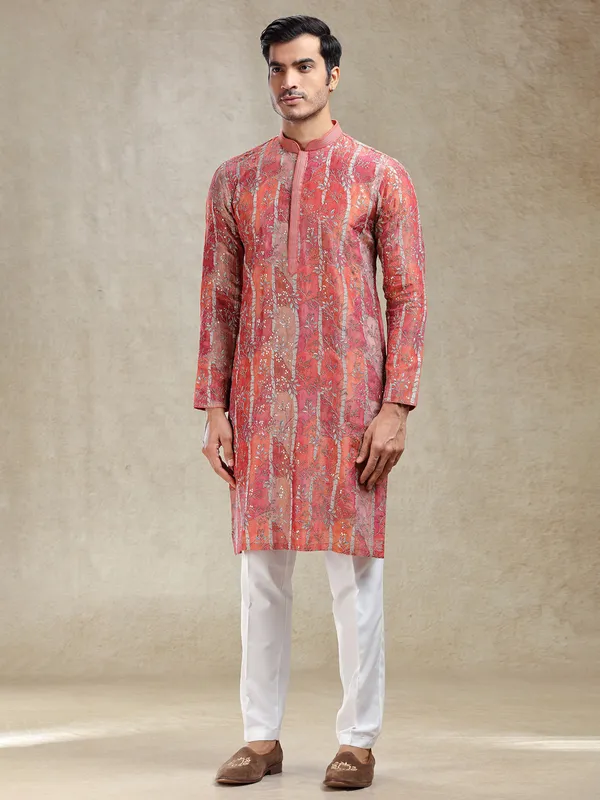 Artisanal grace rust orange kurta suit in intricate work