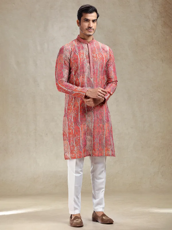 Artisanal grace rust orange kurta suit in intricate work
