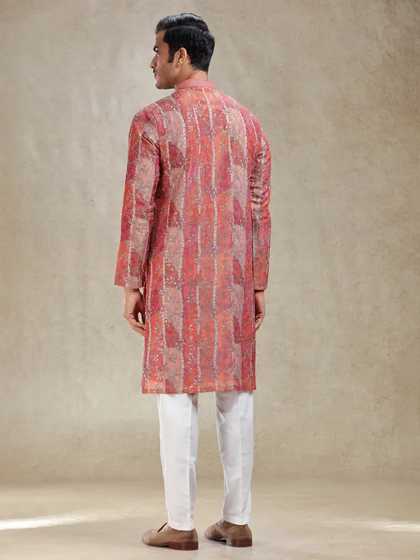 Artisanal grace rust orange kurta suit in intricate work