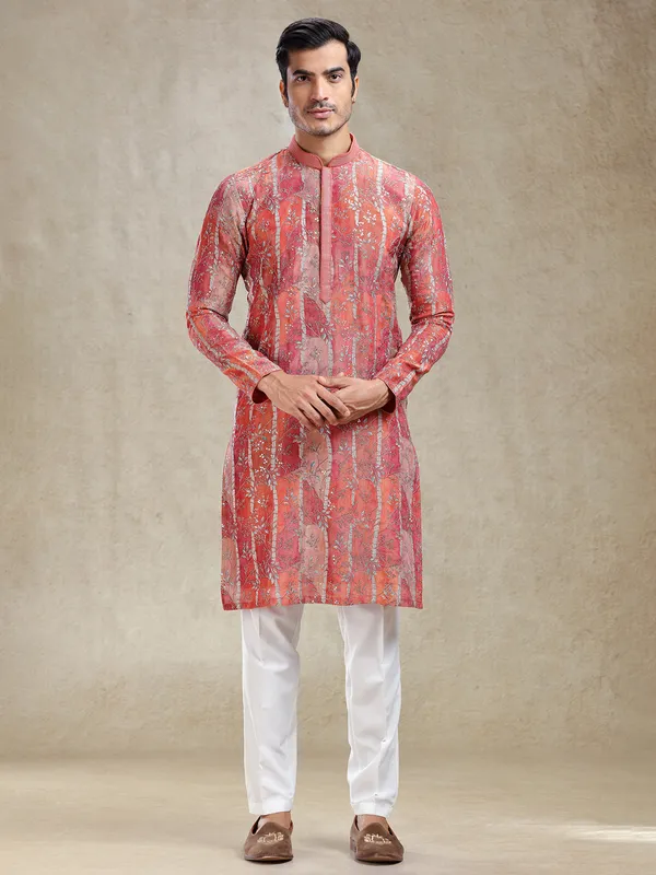 Artisanal grace rust orange kurta suit in intricate work