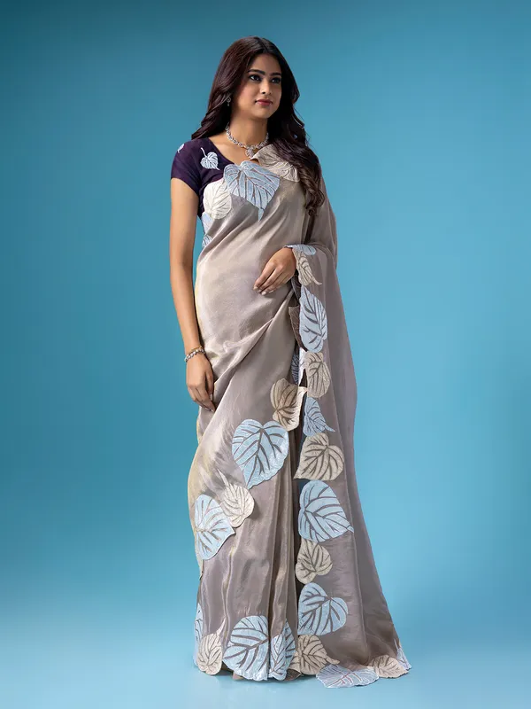 Attractive beige tissue silk saree