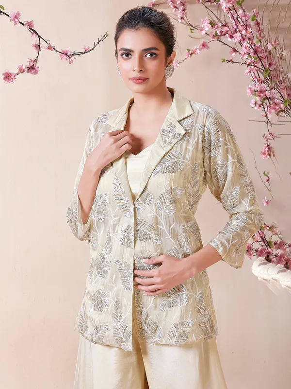 Attractive cream tissue silk palazzo salwar suit
